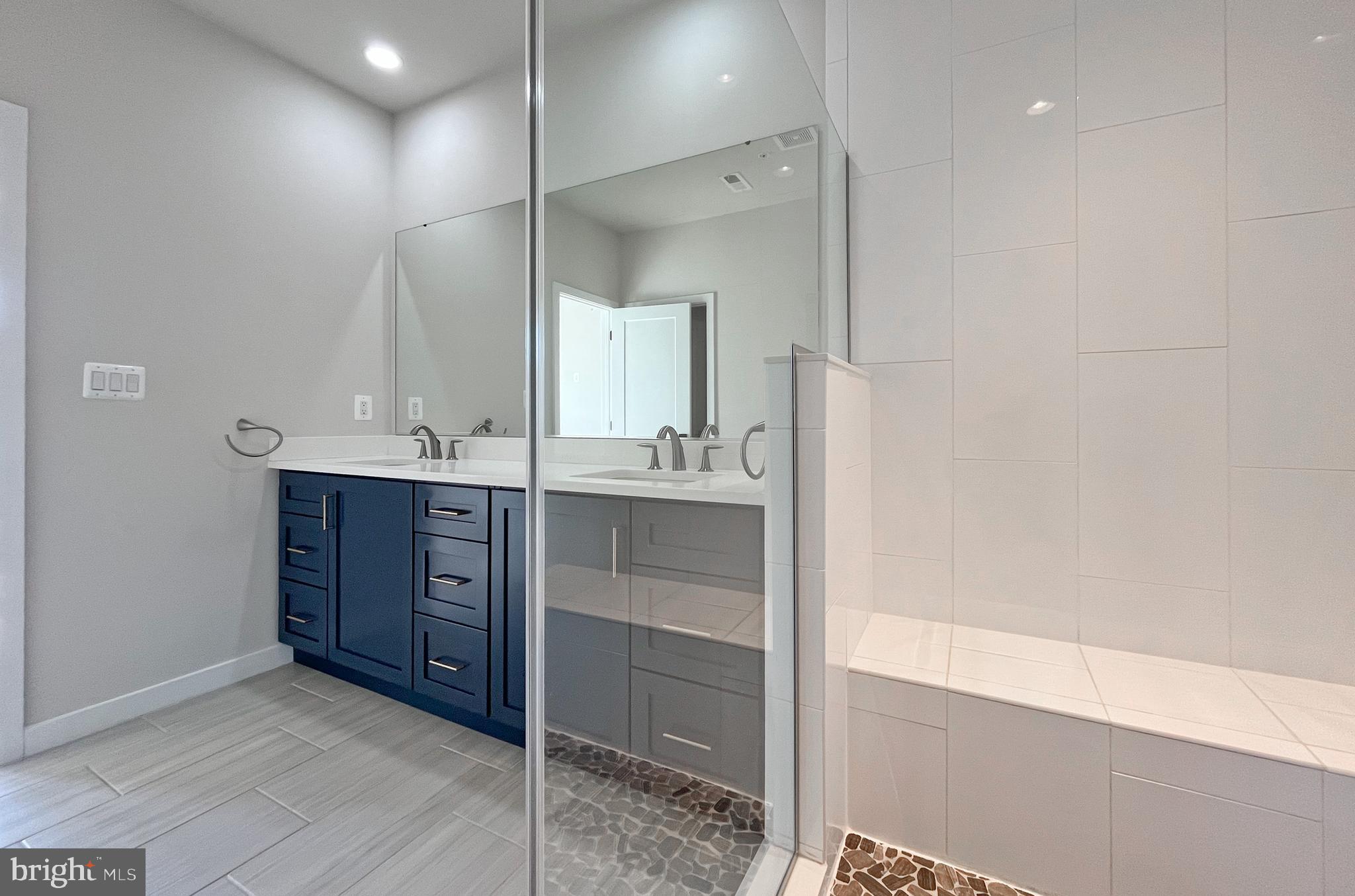 11714 Paysons Way Reston, VA 20191 - Photo 16 of 33 a bathroom with a granite countertop sink mirror and double