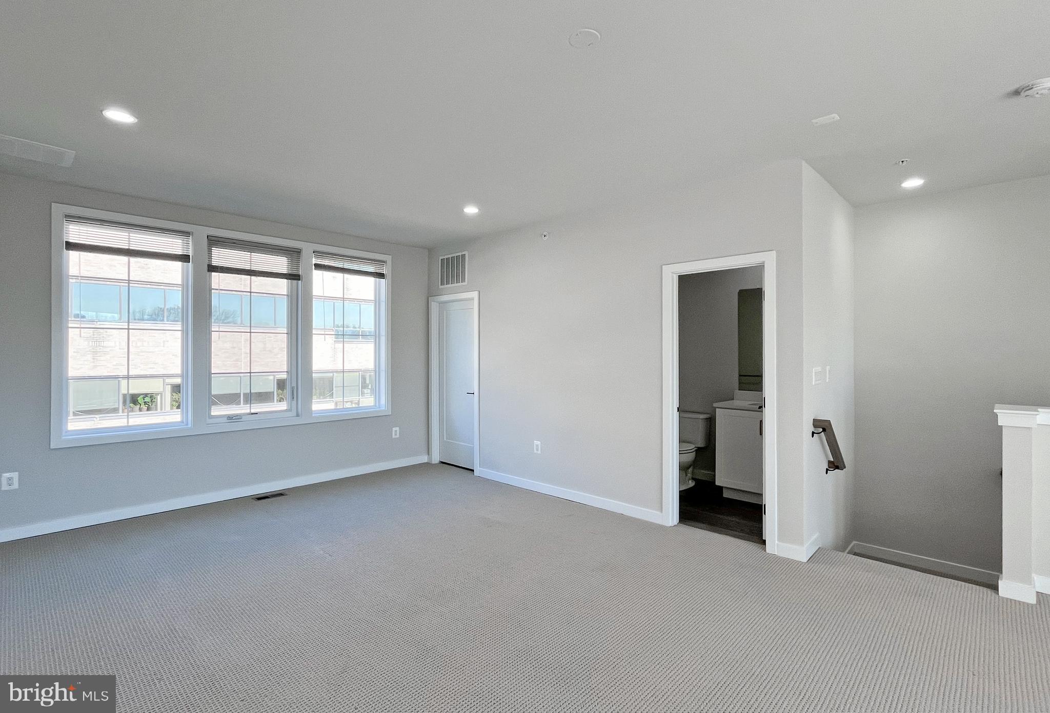 11714 Paysons Way Reston, VA 20191 - Photo 23 of 33 a view of an empty room with a window