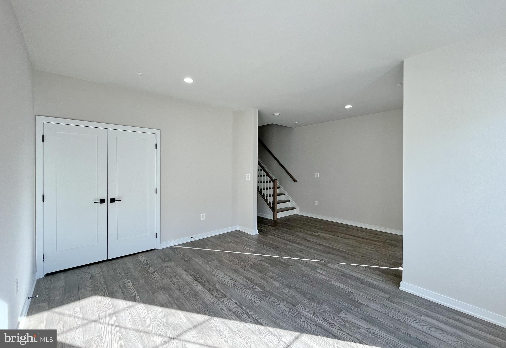 11714 Paysons Way Reston, VA 20191 - Photo 28 of 33 a view of an empty room with wooden floor