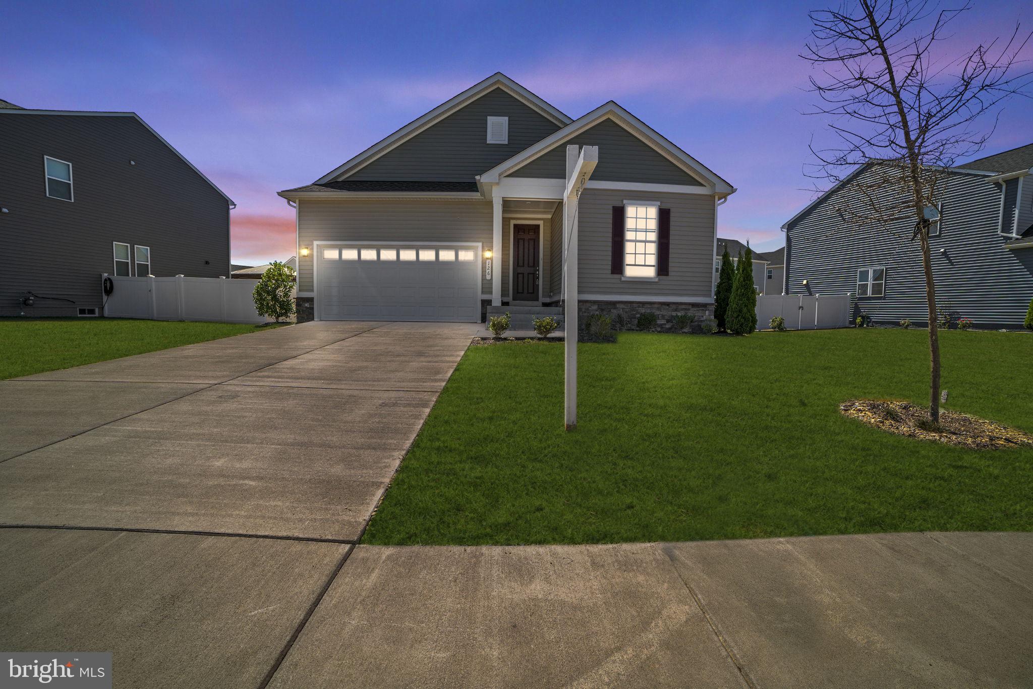 126 Brandenbury Court Stephens City, VA 22655 - Photo 1 of 25 a front view of a house with a yard