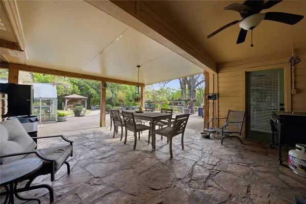 a backyard of a house with lots of green space
