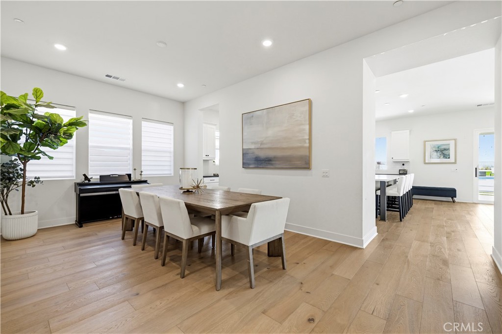 28346 Old Spgs Road Castaic, CA 91384 - Photo 16 of 69 a view of a dining room with furniture and wooden floor