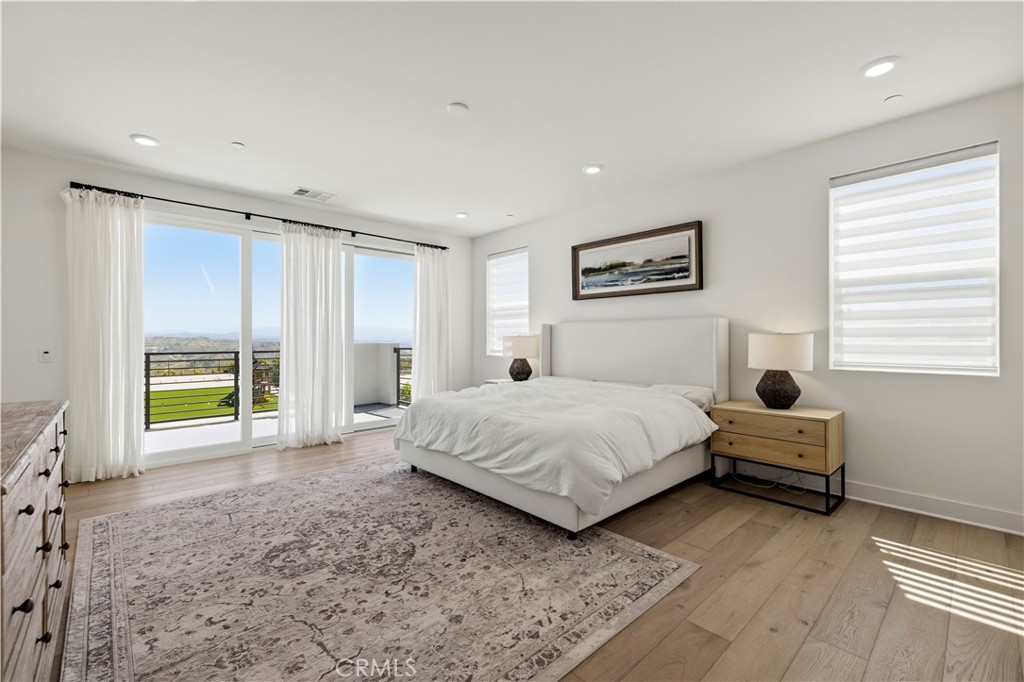 28346 Old Spgs Road Castaic, CA 91384 - Photo 24 of 80 a spacious bedroom with a bed and a view of bedroom