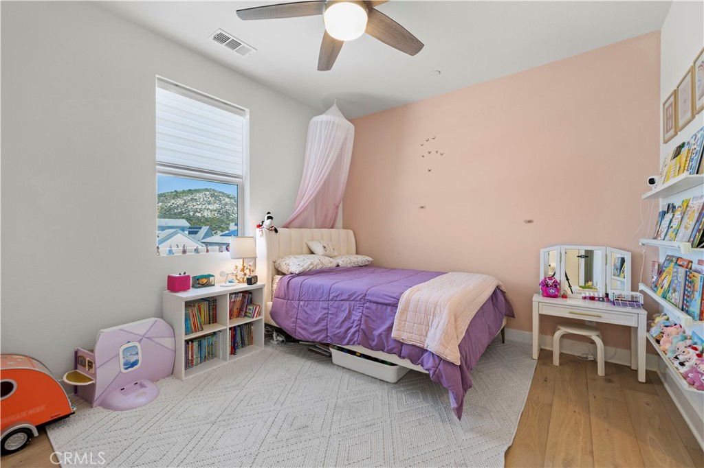 28346 Old Spgs Road Castaic, CA 91384 - Photo 35 of 69 a bedroom with a bed and a window