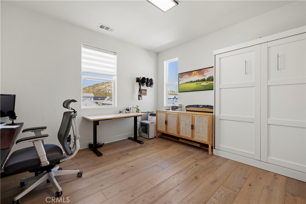 28346 Old Spgs Road Castaic, CA 91384 - Photo 40 of 80 a view of a workspace with furniture and a window