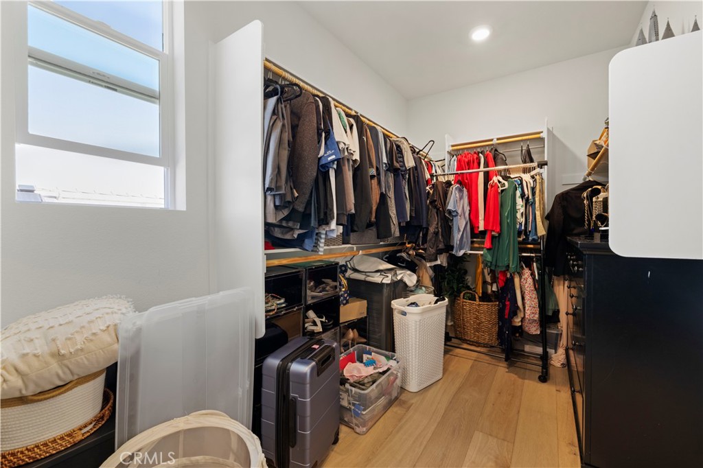 28346 Old Spgs Road Castaic, CA 91384 - Photo 41 of 69 a view of walk in closet with clothes and shoes