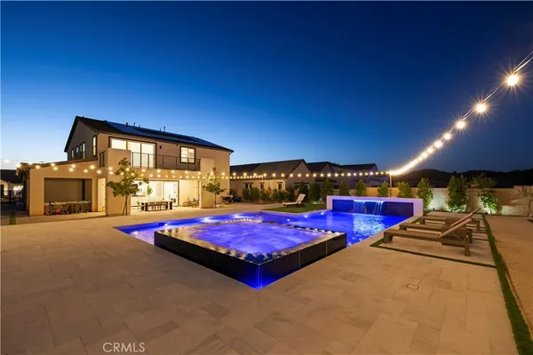 an aerial view of a pool and a terrace view