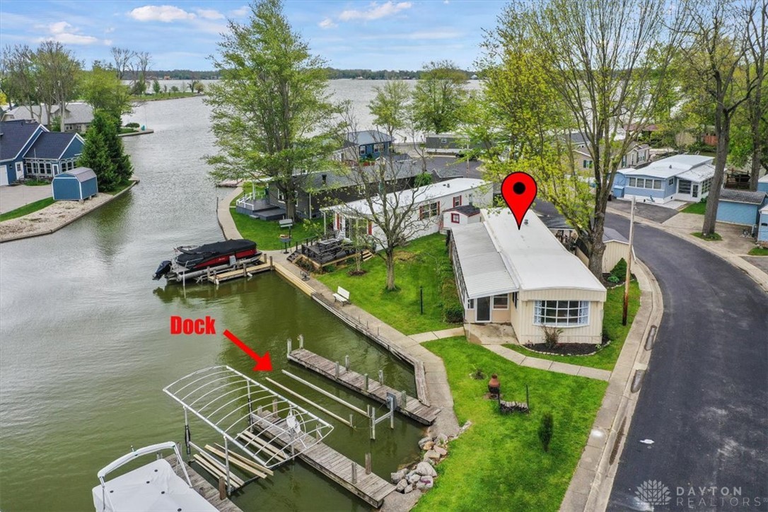 246 North Orchard Island Road Russells Point, OH 43348 - Photo 32 of 43 This charming property offers direct water access with a private boat dock, perfect for waterfront living.