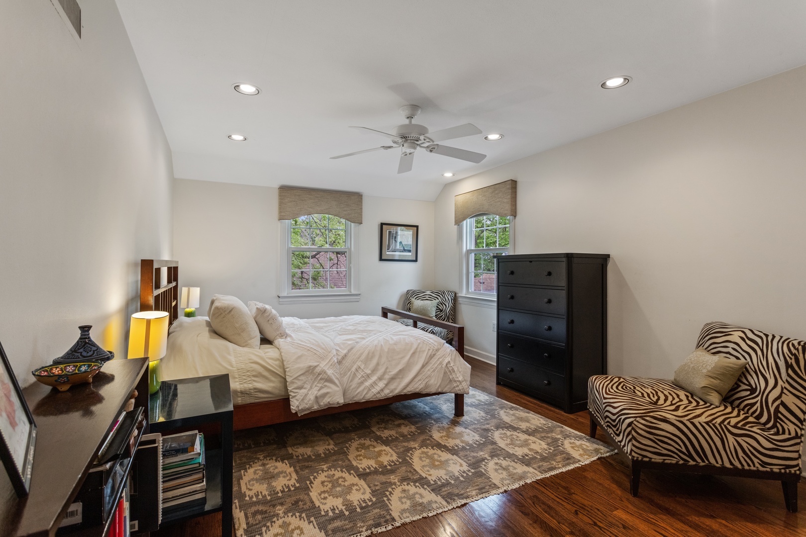 1152 Raleigh Road Glenview, IL 60025 - Photo 15 of 23 a bedroom with a bed and furniture