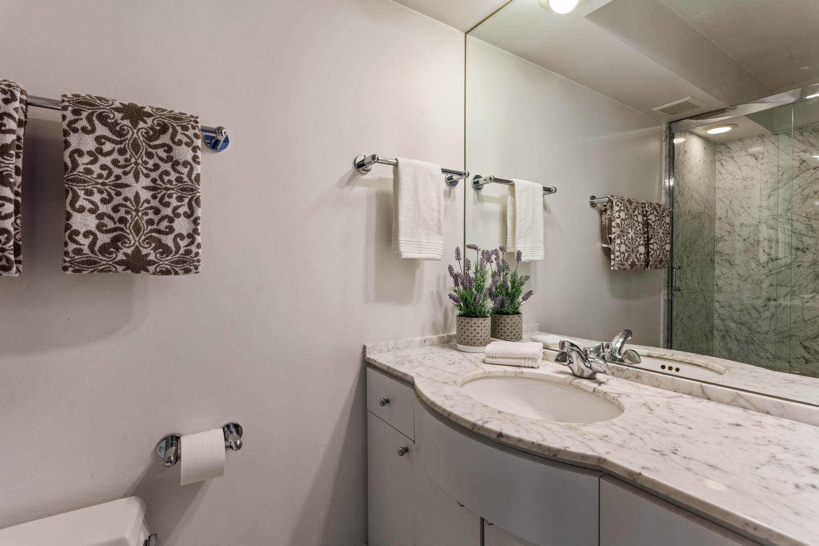 1152 Raleigh Road Glenview, IL 60025 - Photo 16 of 23 a bathroom with a granite countertop sink and a mirror