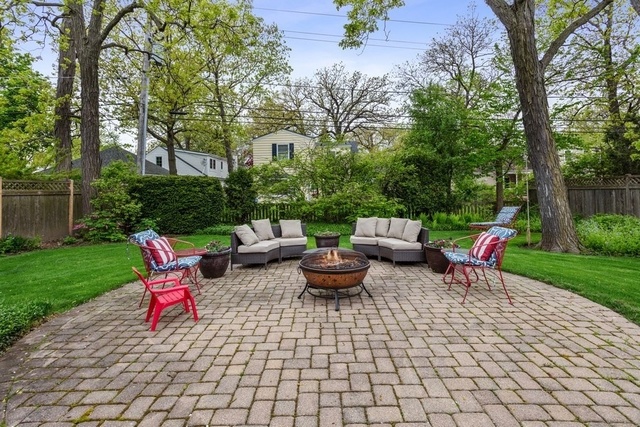 1152 Raleigh Road Glenview, IL 60025 - Photo 20 of 23 a backyard of a house with seating space