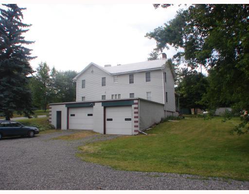 108 Old Maids Road Ruffs Dale, PA 15679 - Photo 14 of 18 Parking Lot/Garage. Garage on side of home