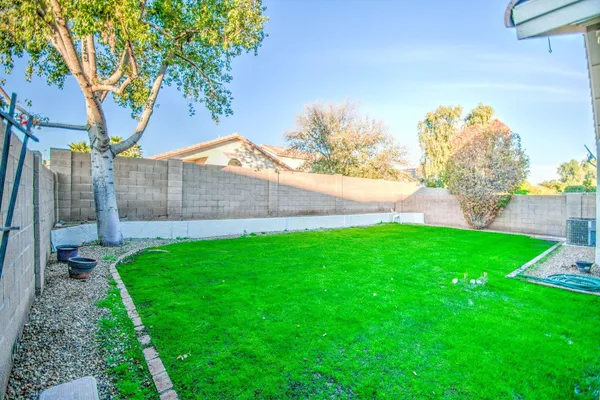 a view of a backyard with a garden