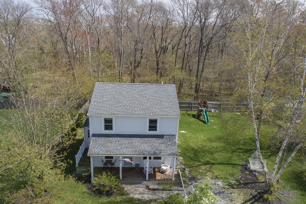 8 Seamore Road Scituate, MA 02066 - Photo 21 of 28 a aerial view of a house with a yard