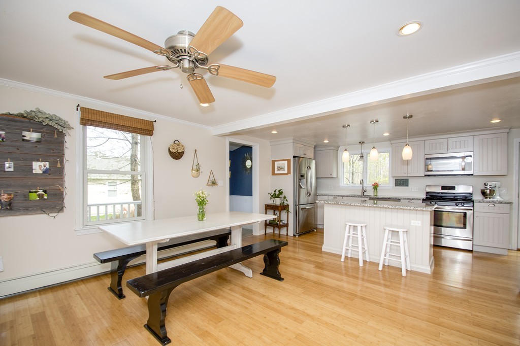 8 Seamore Road Scituate, MA 02066 - Photo 7 of 28 a living room with stainless steel appliances kitchen island granite countertop furniture and a large window