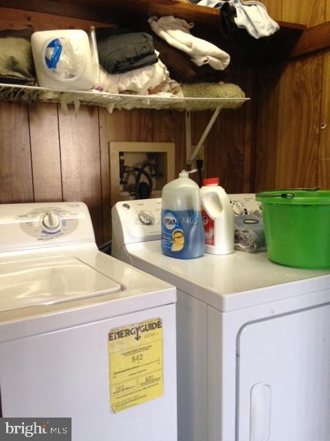 12917 Tull Road Whaleyville, MD 21872 - Photo 14 of 15 a utility room with dryer and washer