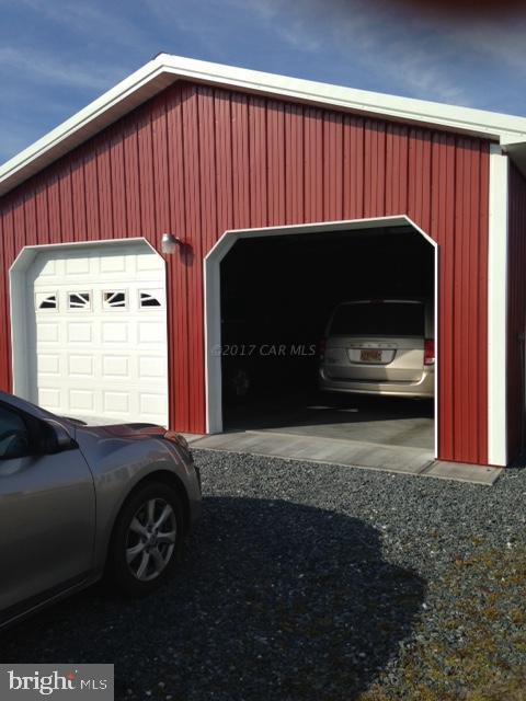 12917 Tull Road Whaleyville, MD 21872 - Photo 6 of 15 a view of a car park side of the house