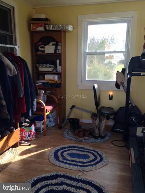 12917 Tull Road Whaleyville, MD 21872 - Photo 9 of 15 a living room with furniture a rug and a window