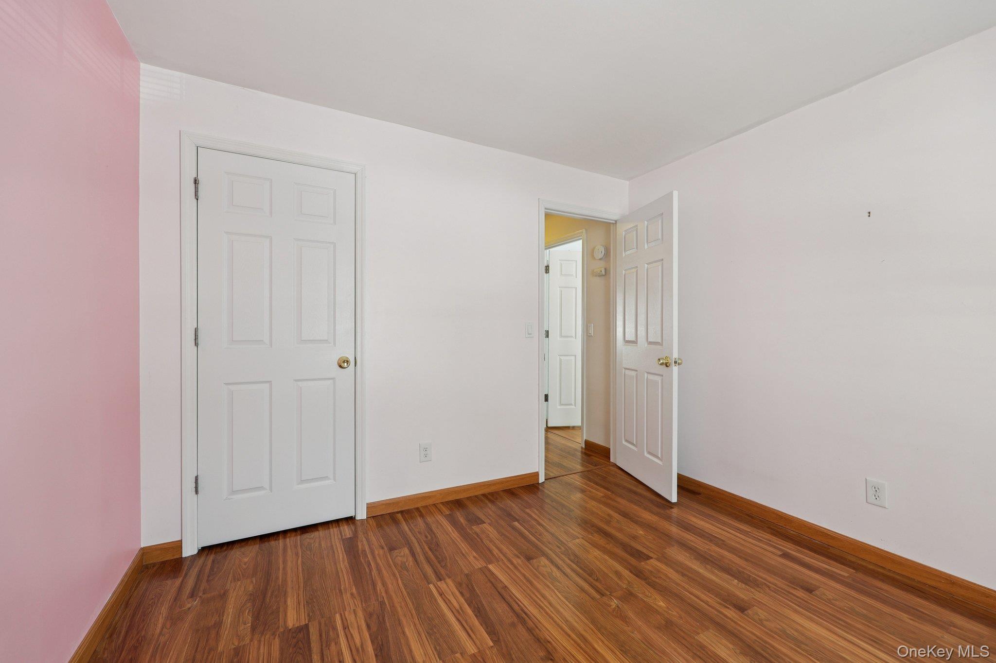 14 Lexington Hills Road, Unit 3 Harriman, NY 10926 - Photo 20 of 30 a view of an empty room with wooden floor