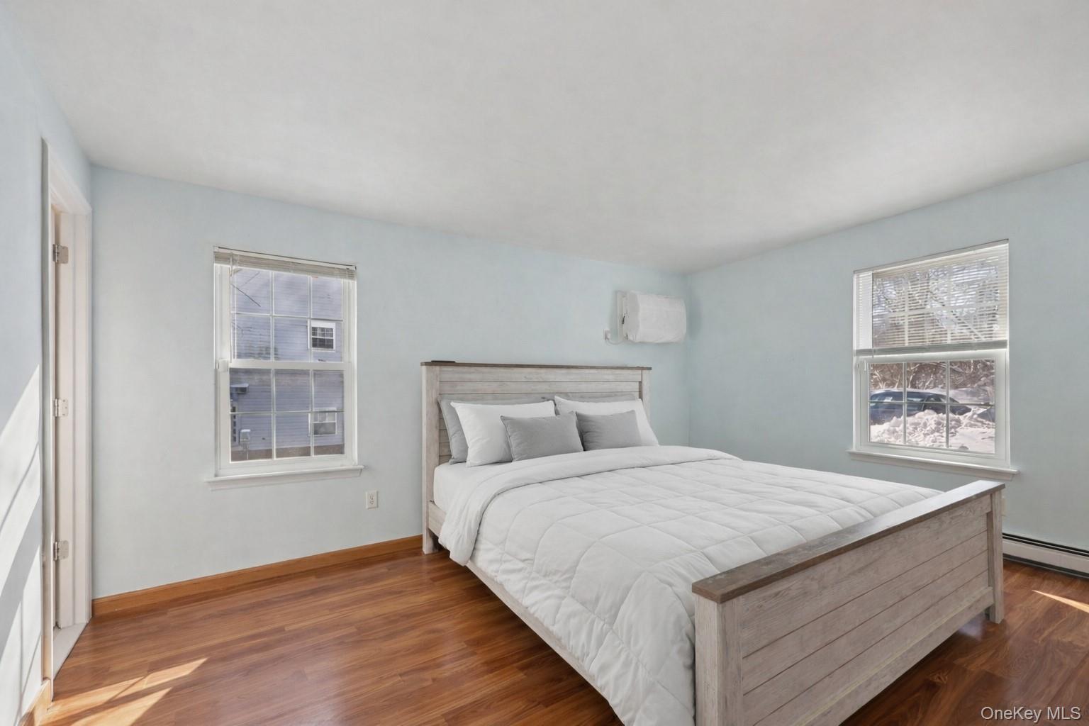 14 Lexington Hills Road, Unit 3 Harriman, NY 10926 - Photo 22 of 30 a bedroom with a large bed and a window