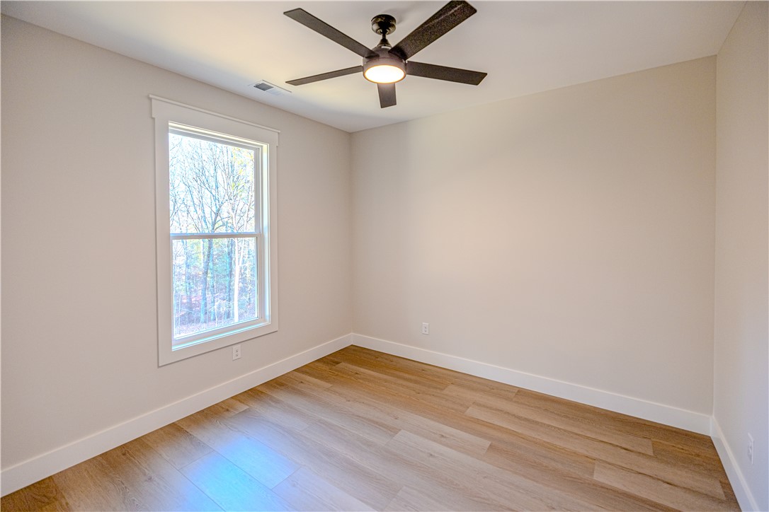 1409 Stonehurst Road Anderson, SC 29621 - Photo 22 of 37 This bright room features a large window, offering serene views and natural light.