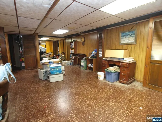 a lobby with furniture and window