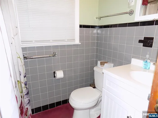 a bathroom with a sink and toilet