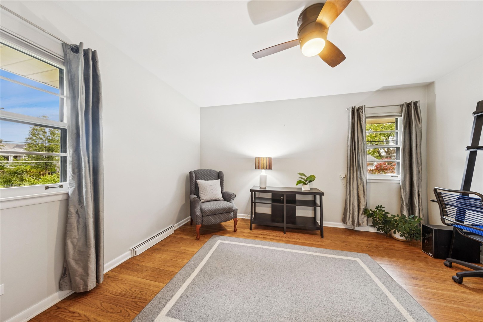 465 East Hillside Road Naperville, IL 60540 - Photo 12 of 23 a bedroom with furniture and a window