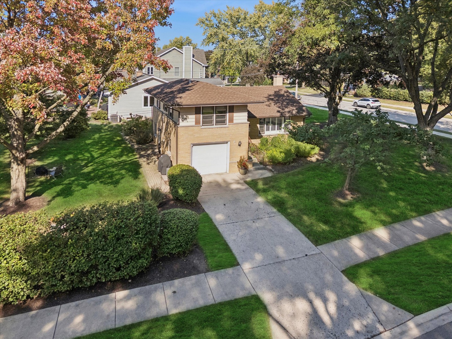 465 East Hillside Road Naperville, IL 60540 - Photo 16 of 23 a view of a front of house with a yard