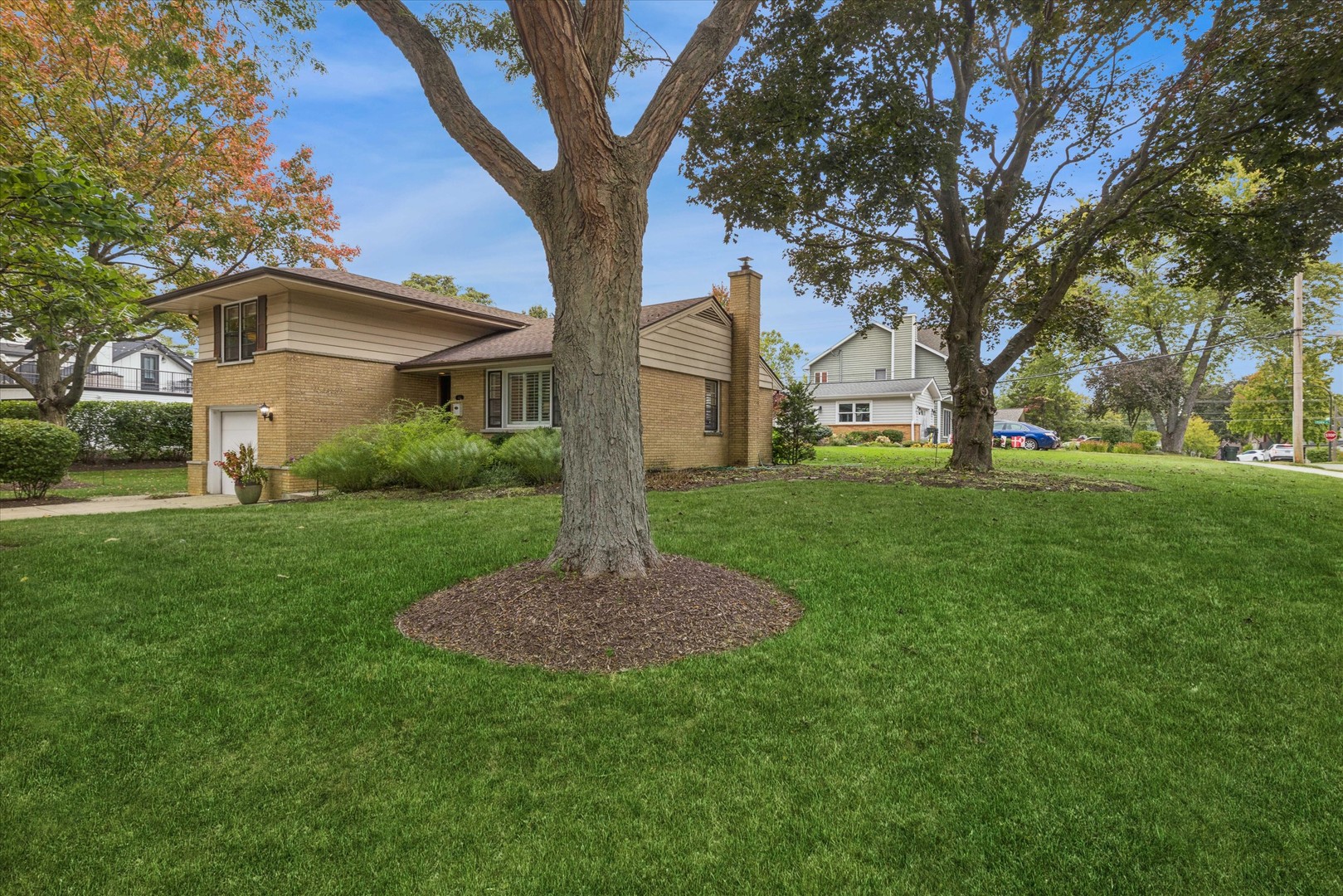 465 East Hillside Road Naperville, IL 60540 - Photo 2 of 23 a view of a house with a yard