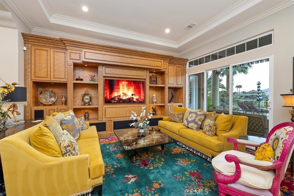 20 Vista Encantada Rancho Mirage, CA 92270 - Photo 17 of 75 a living room with furniture and a flat screen tv