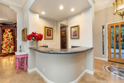 a kitchen with stainless steel appliances granite countertop a stove a sink dishwasher a microwave oven with granite countertops and cabinets