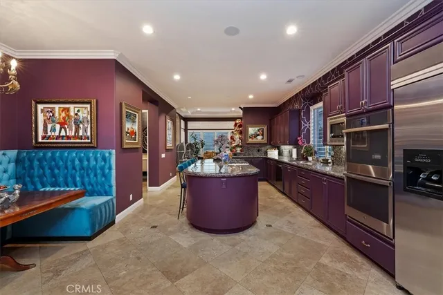 a bathroom with a toilet sink and shower