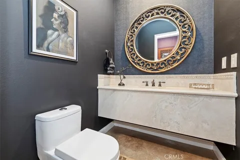 a large spacious bathroom with a large tub shower and sink
