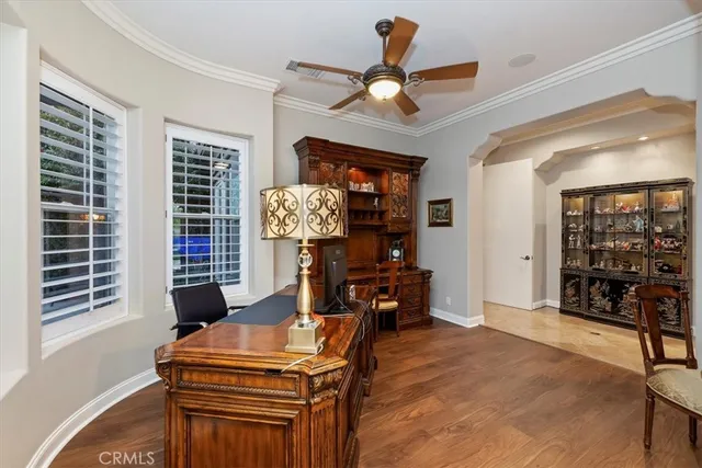 a spacious bathroom with a tub double vanity and a sink