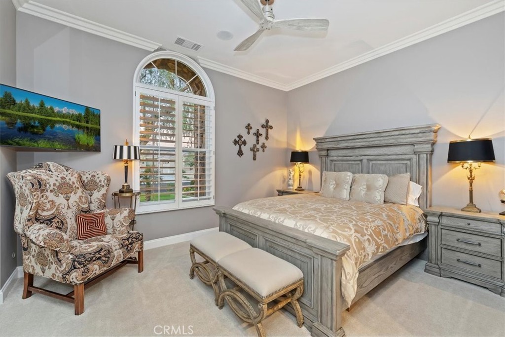 20 Vista Encantada Rancho Mirage, CA 92270 - Photo 38 of 75 a bedroom with a bed and a couch