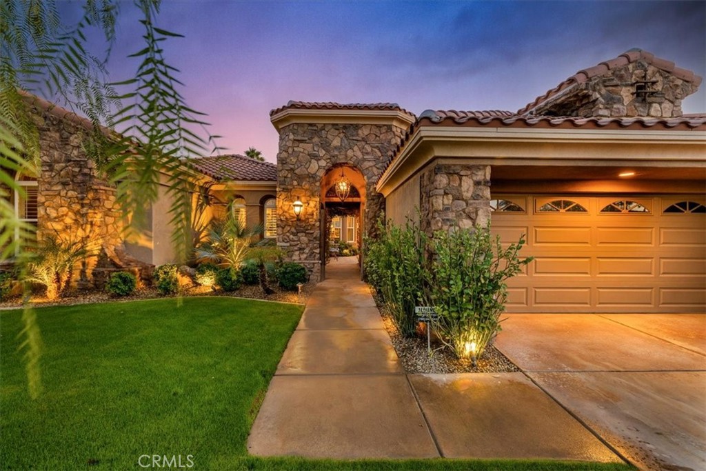 20 Vista Encantada Rancho Mirage, CA 92270 - Photo 69 of 75 a front view of a house with garden