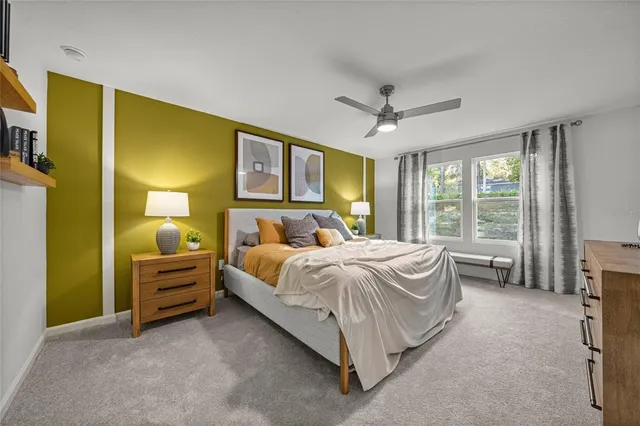 a bed room with a bed and a tv