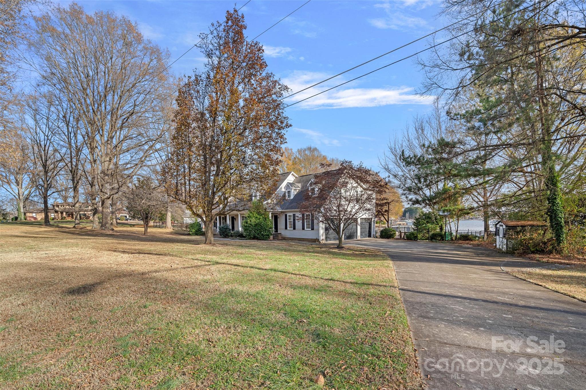 18032 Nantz Road Cornelius, NC 28031 - Photo 18 of 26 a view of road and trees