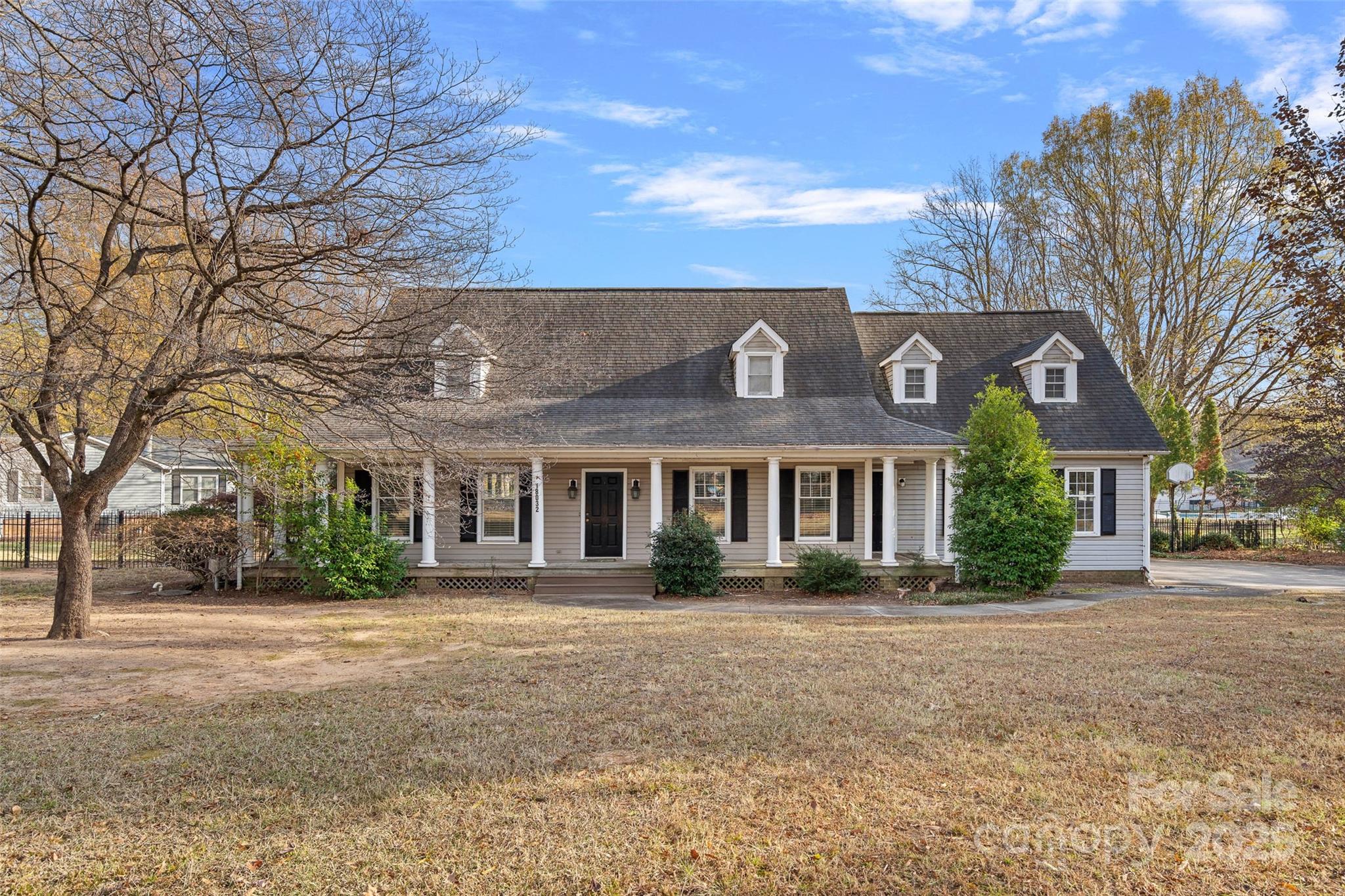 18032 Nantz Road Cornelius, NC 28031 - Photo 19 of 26 a front view of house with yard and trees around