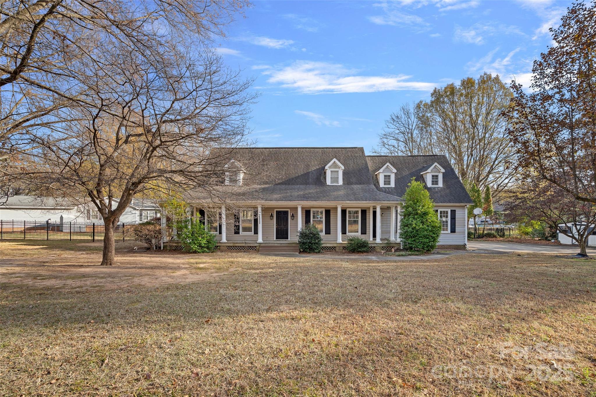 18032 Nantz Road Cornelius, NC 28031 - Photo 20 of 26 a front view of a house with a yard