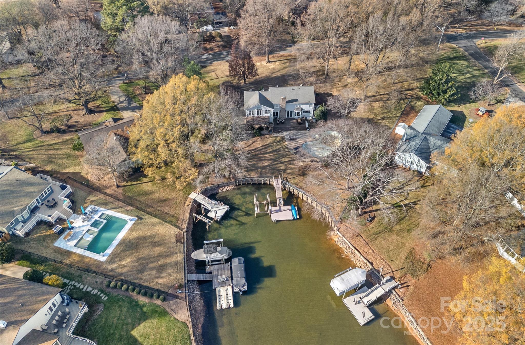 18032 Nantz Road Cornelius, NC 28031 - Photo 5 of 26 an aerial view of residential houses with outdoor space