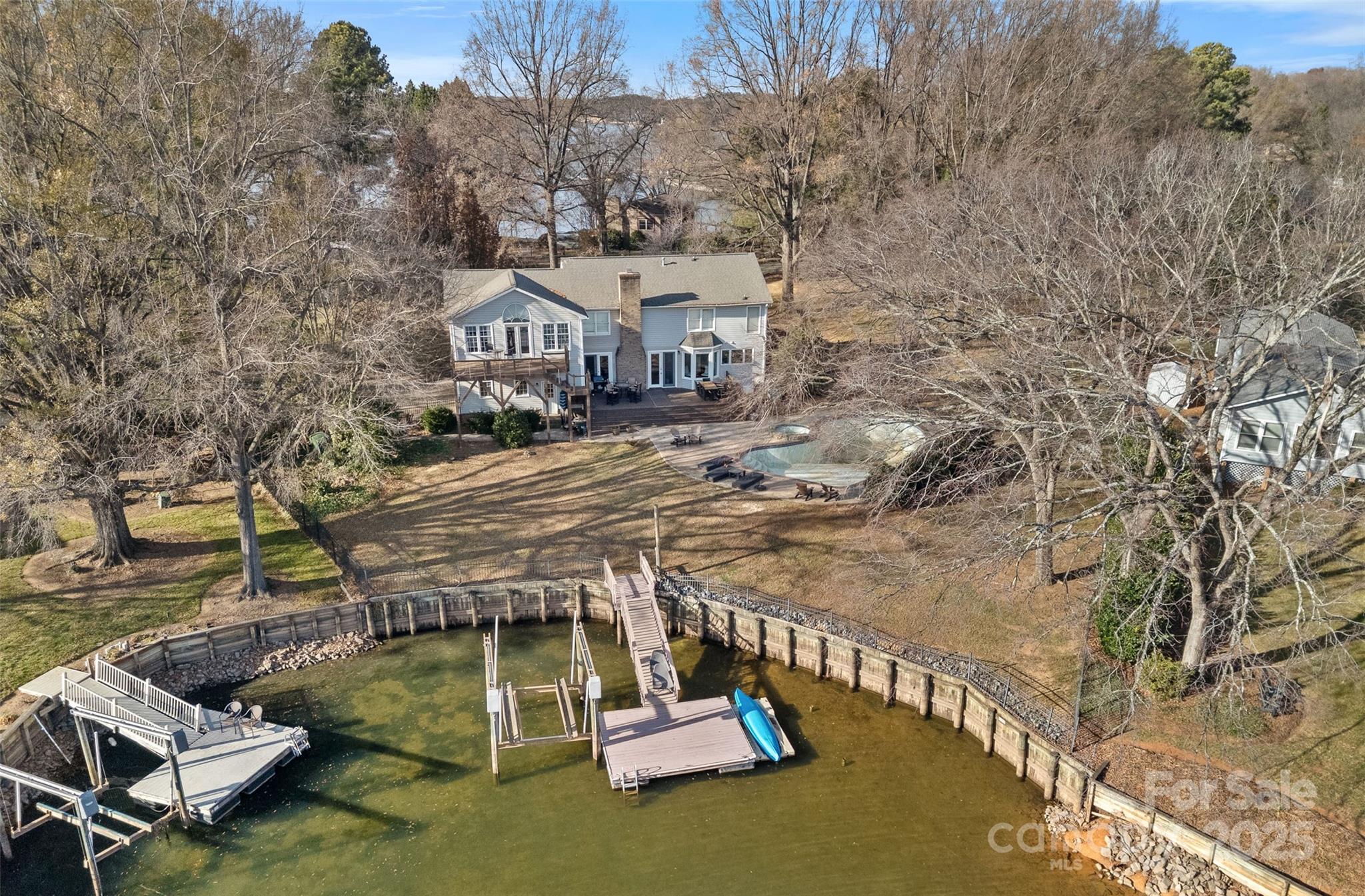 18032 Nantz Road Cornelius, NC 28031 - Photo 8 of 26 a view of a house with a yard