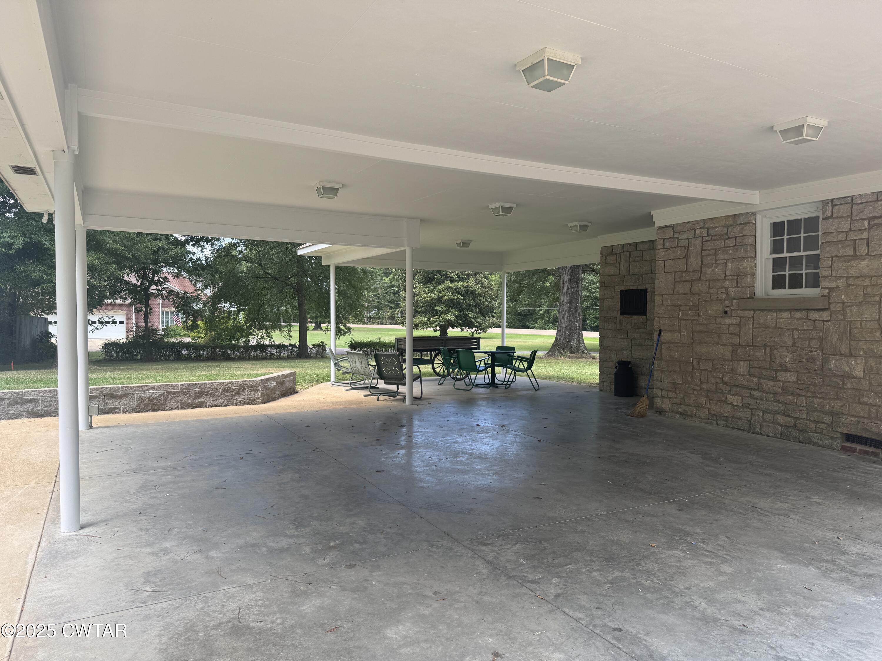 511 White Avenue Henderson, TN 38340 - Photo 11 of 28 a view of empty room with floor to ceiling window