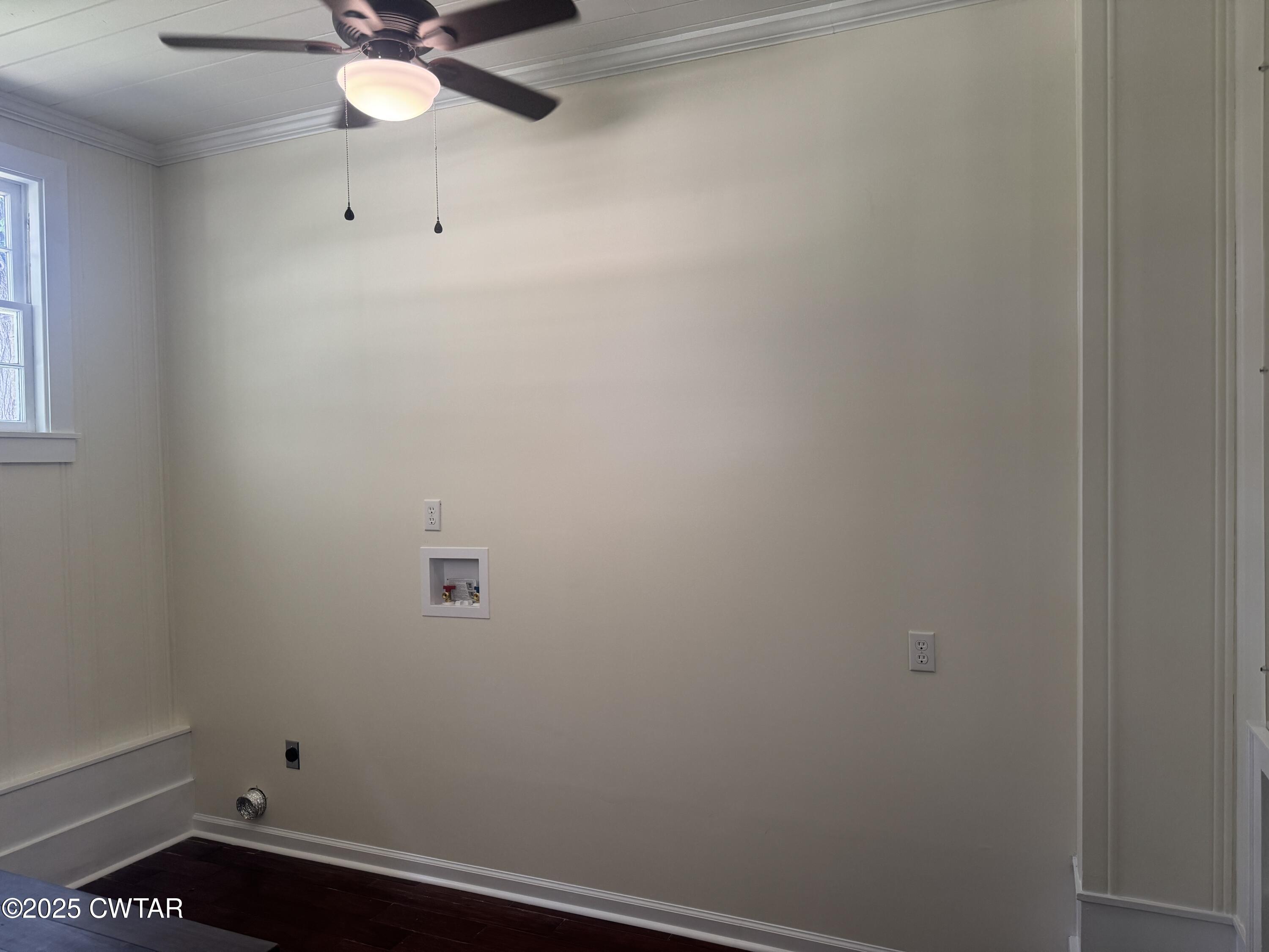 511 White Avenue Henderson, TN 38340 - Photo 23 of 28 an empty room with a fan