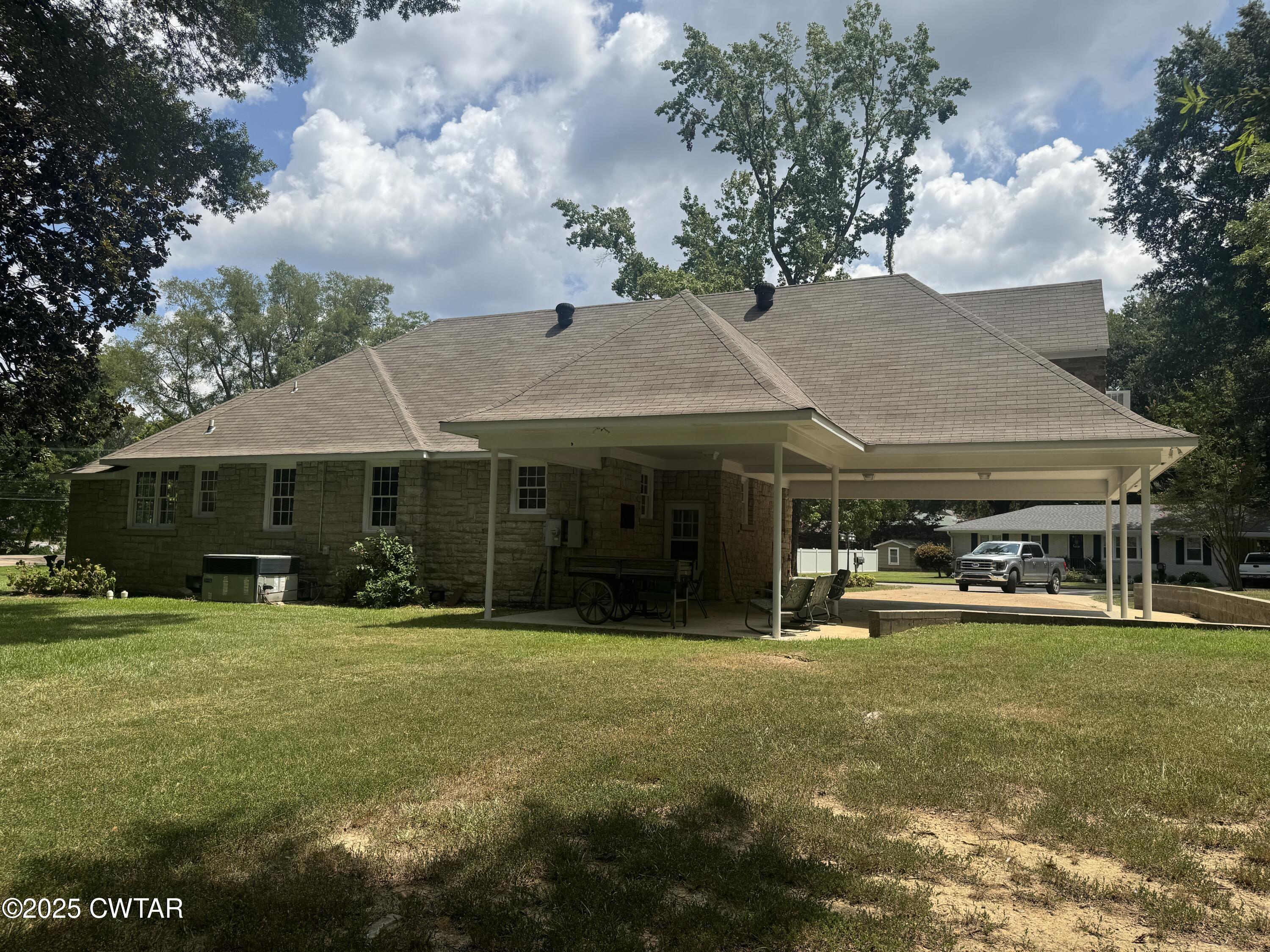 511 White Avenue Henderson, TN 38340 - Photo 6 of 28 a view of a house with yard and sitting area