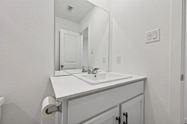 a sink with a mirror