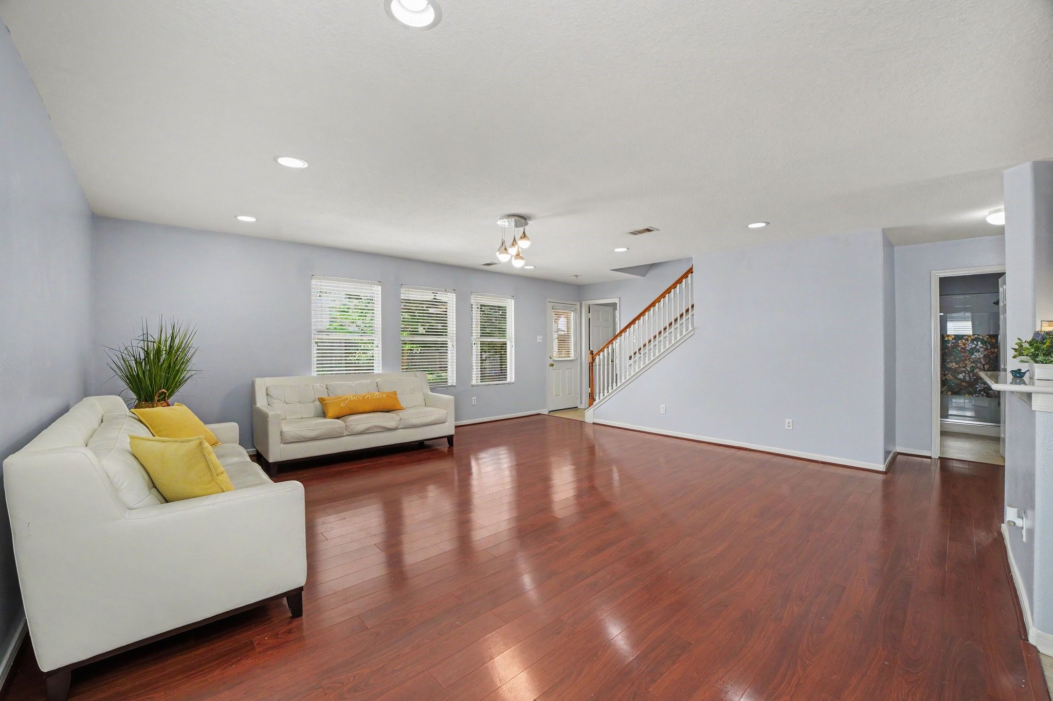 5622 Wasabi Lane Baytown, TX 77521 - Photo 3 of 29 a living room with furniture and a wooden floor