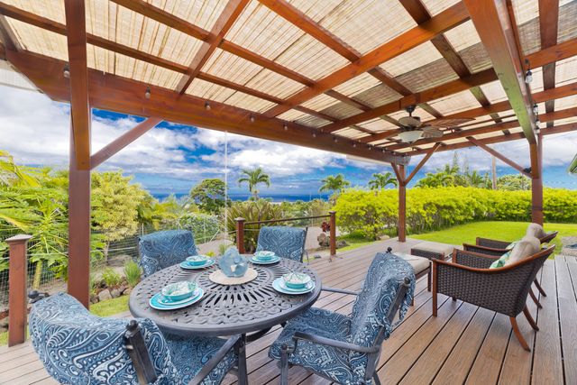 a view of yard with patio