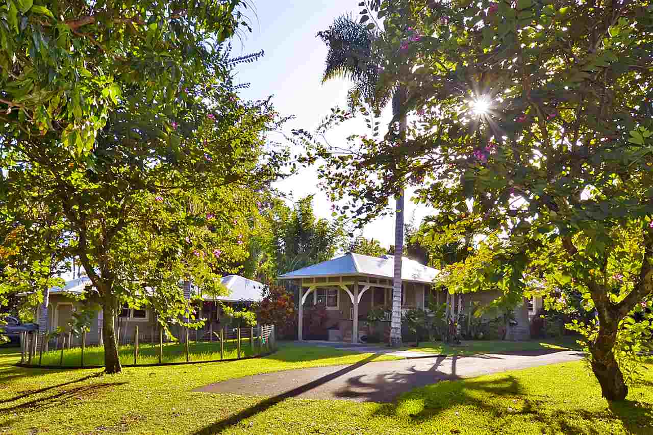261 Awalau Road Haiku, HI 96708 - Photo 1 of 29 a view of a house with swimming pool